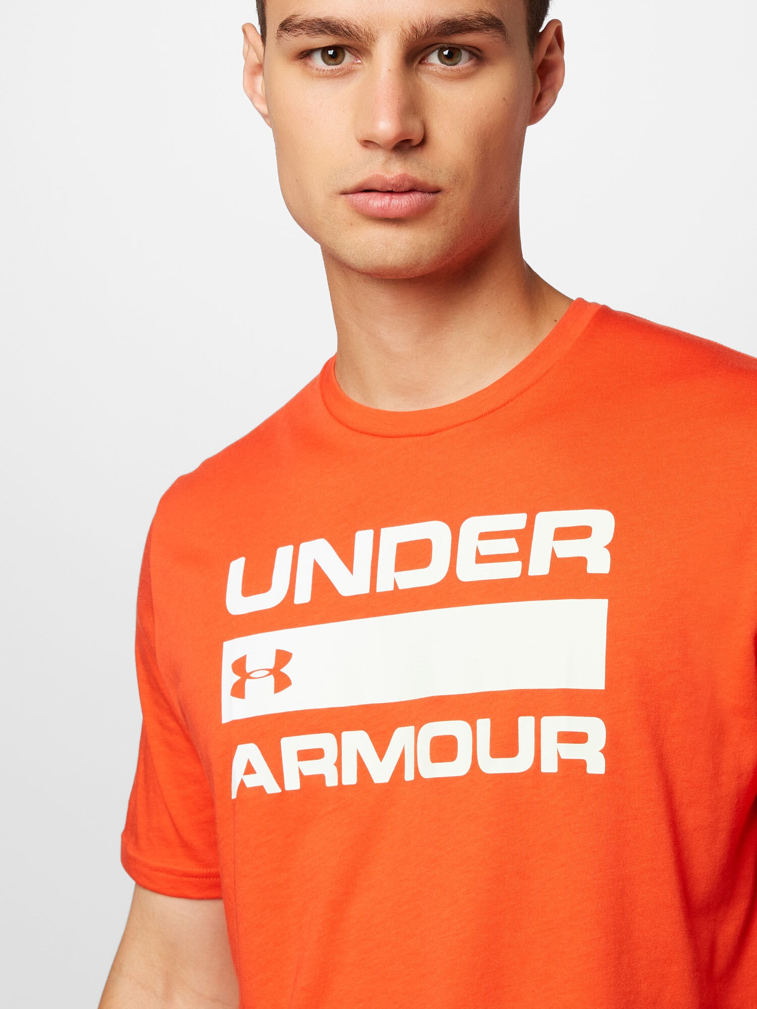 UNDER ARMOUR Funkcionalna majica 'Team Issue' oranžno rdeča / bela - Pepit.si