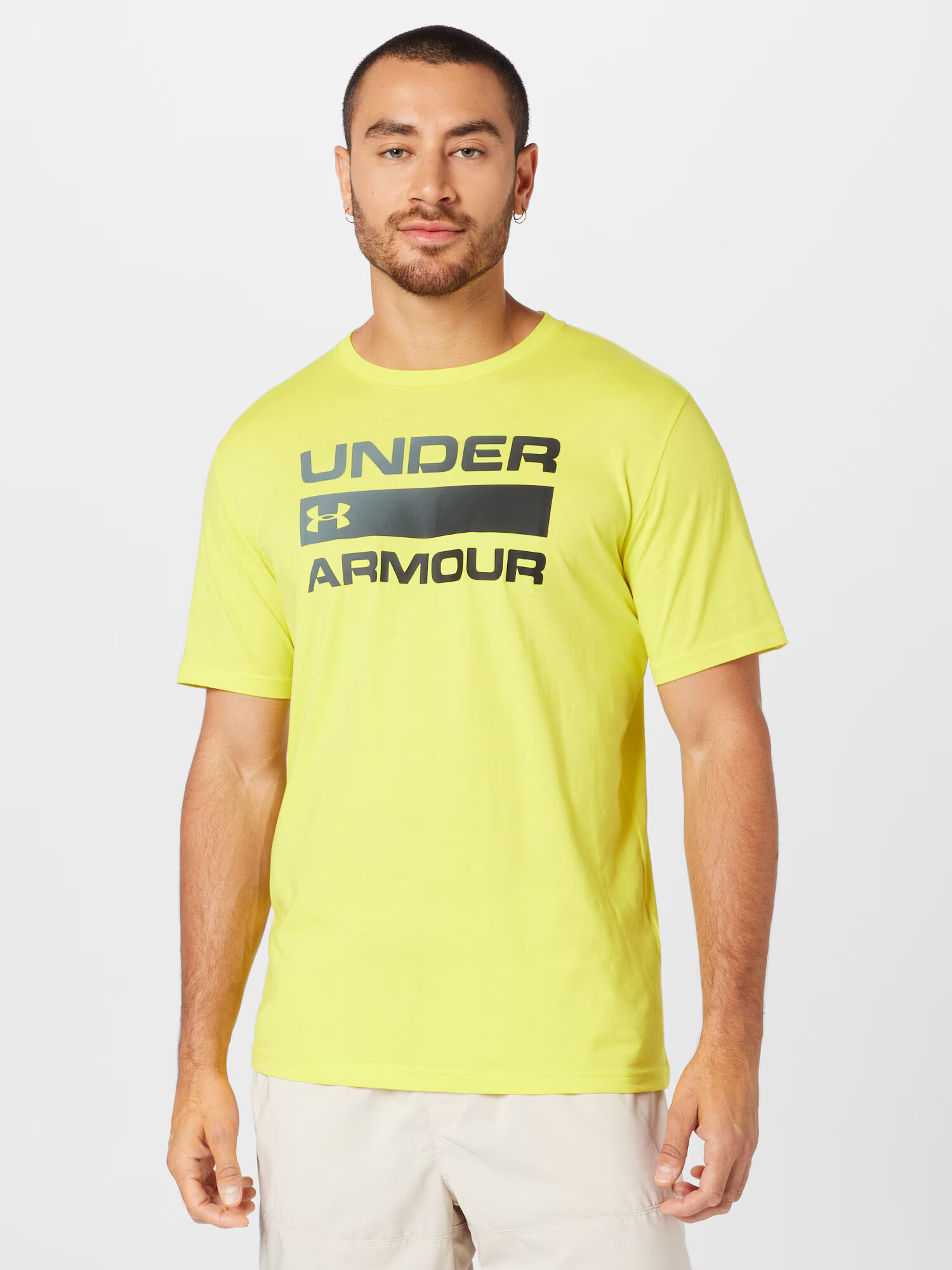 UNDER ARMOUR Majica 'TEAM ISSUE' rumena / črna - Pepit.si