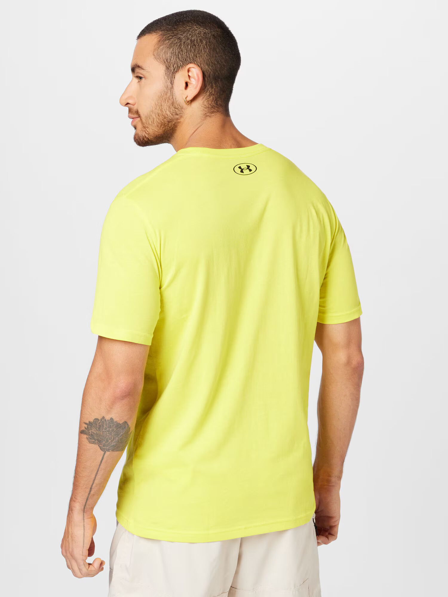 UNDER ARMOUR Majica 'TEAM ISSUE' rumena / črna - Pepit.si