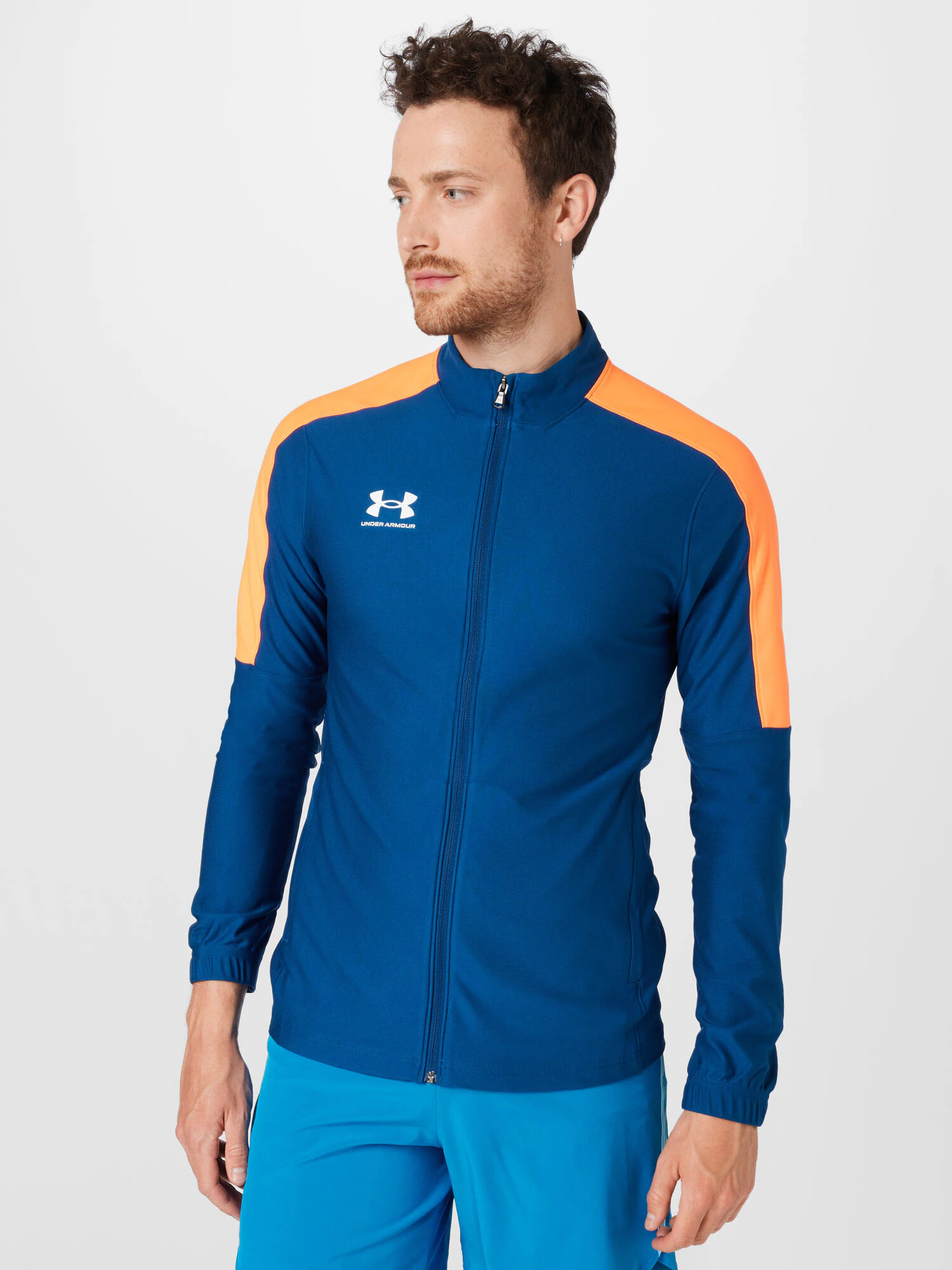 UNDER ARMOUR Športna jakna 'Challenger' modra / oranžna - Pepit.si