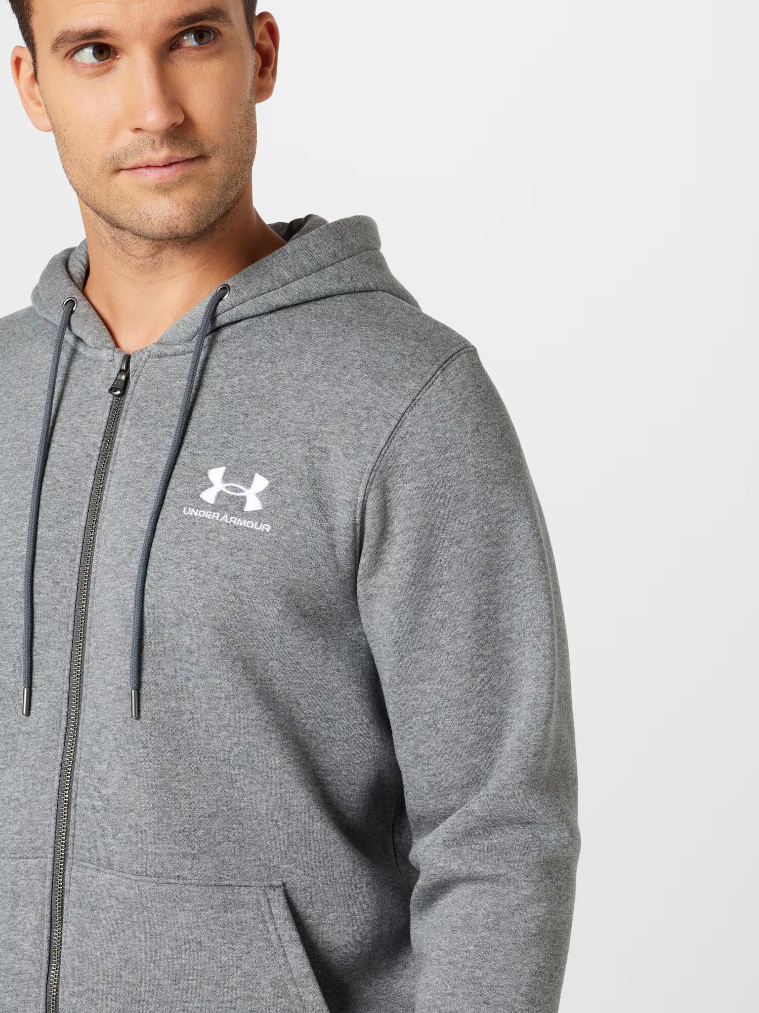 UNDER ARMOUR Športna jopa na zadrgo siva / bela - Pepit.si