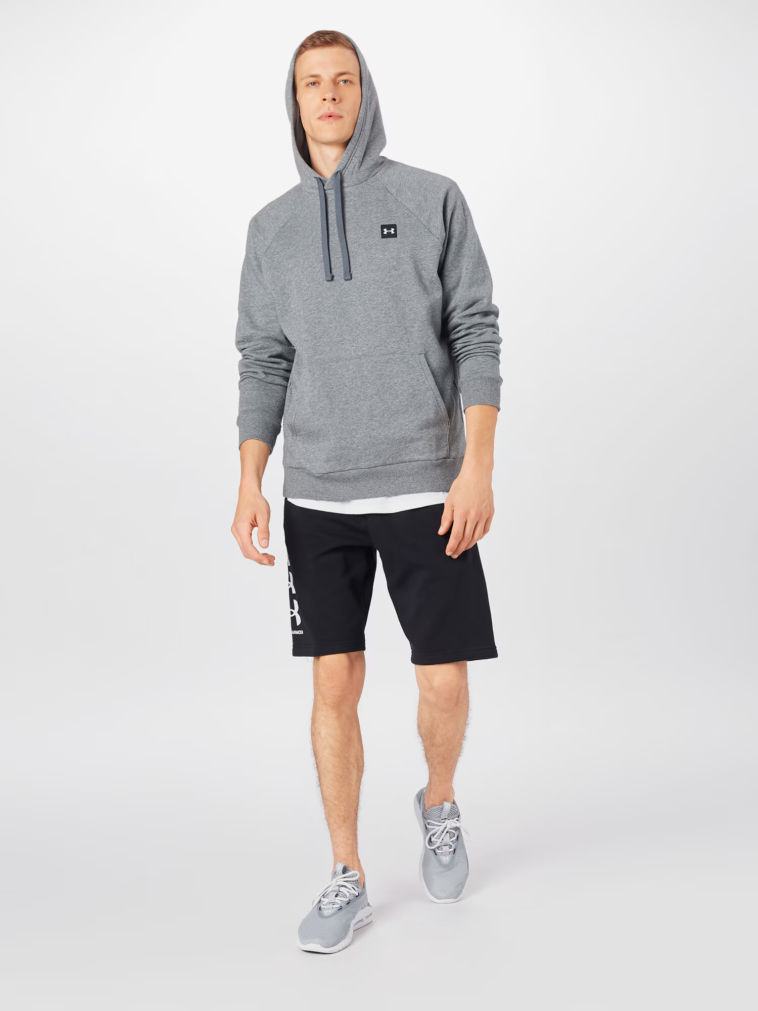 UNDER ARMOUR Športna majica 'Rival' pegasto siva / črna - Pepit.si