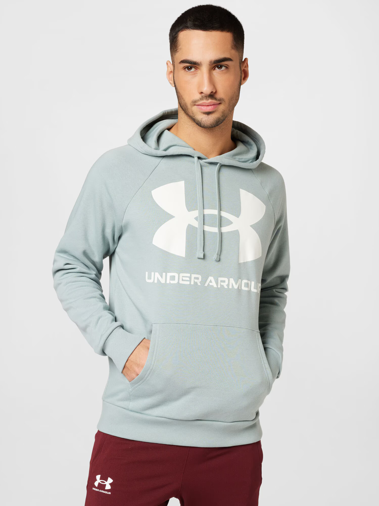 UNDER ARMOUR Športna majica 'Rival' meta / bela - Pepit.si