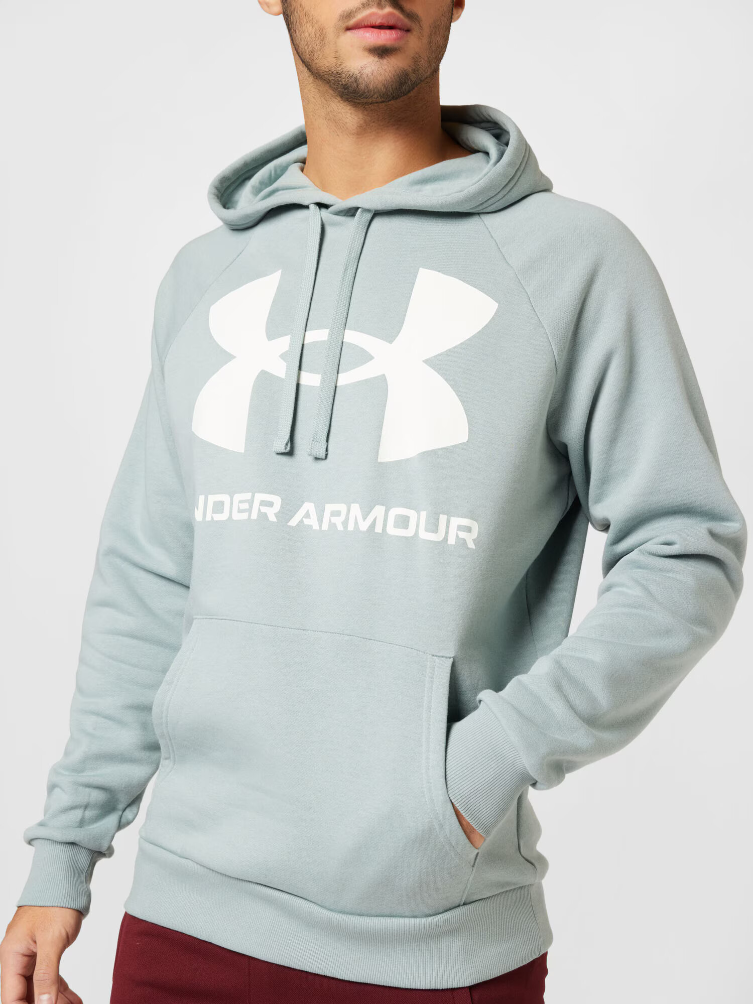 UNDER ARMOUR Športna majica 'Rival' meta / bela - Pepit.si