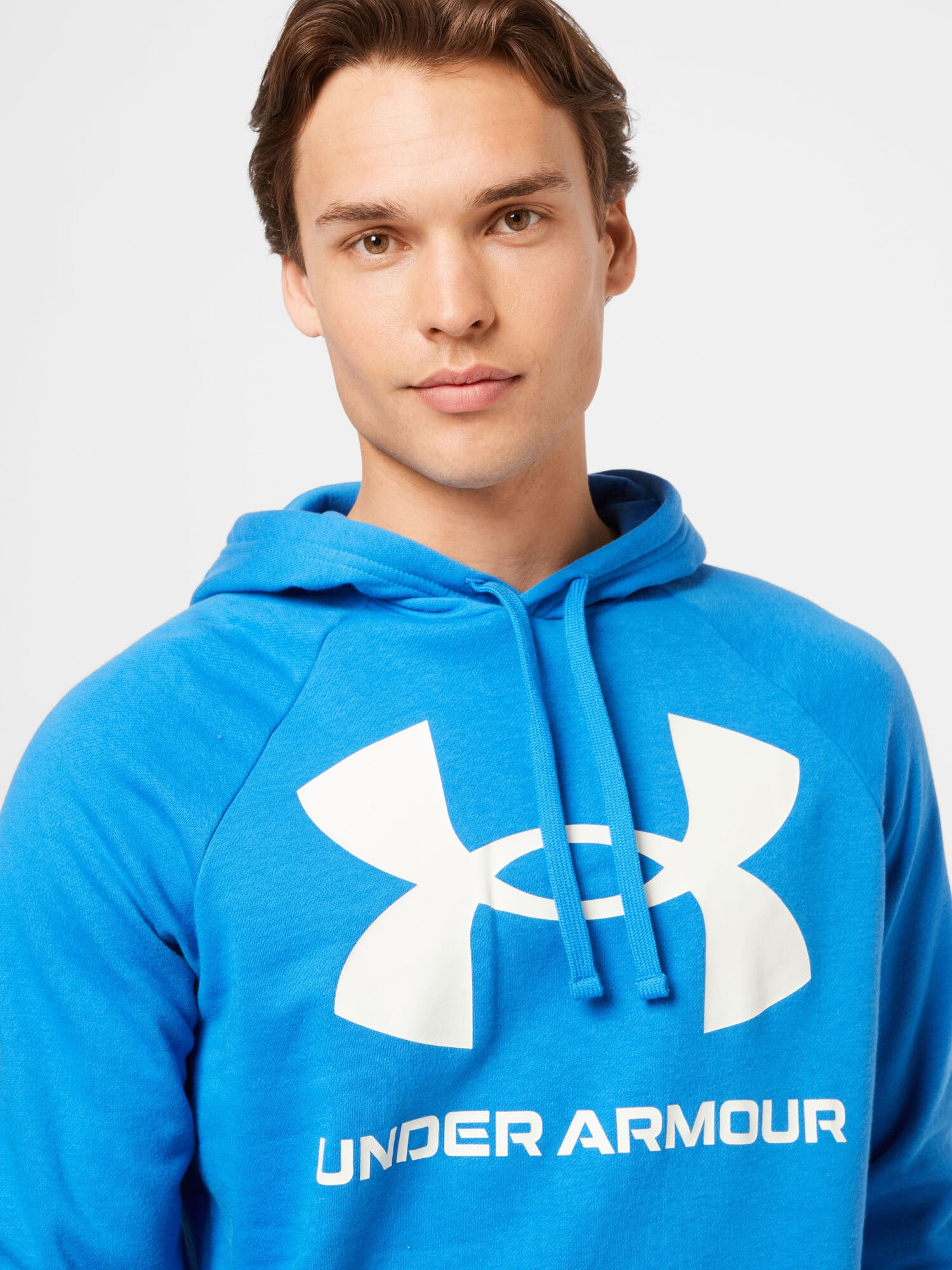 UNDER ARMOUR Športna majica 'Rival' modra / bela - Pepit.si