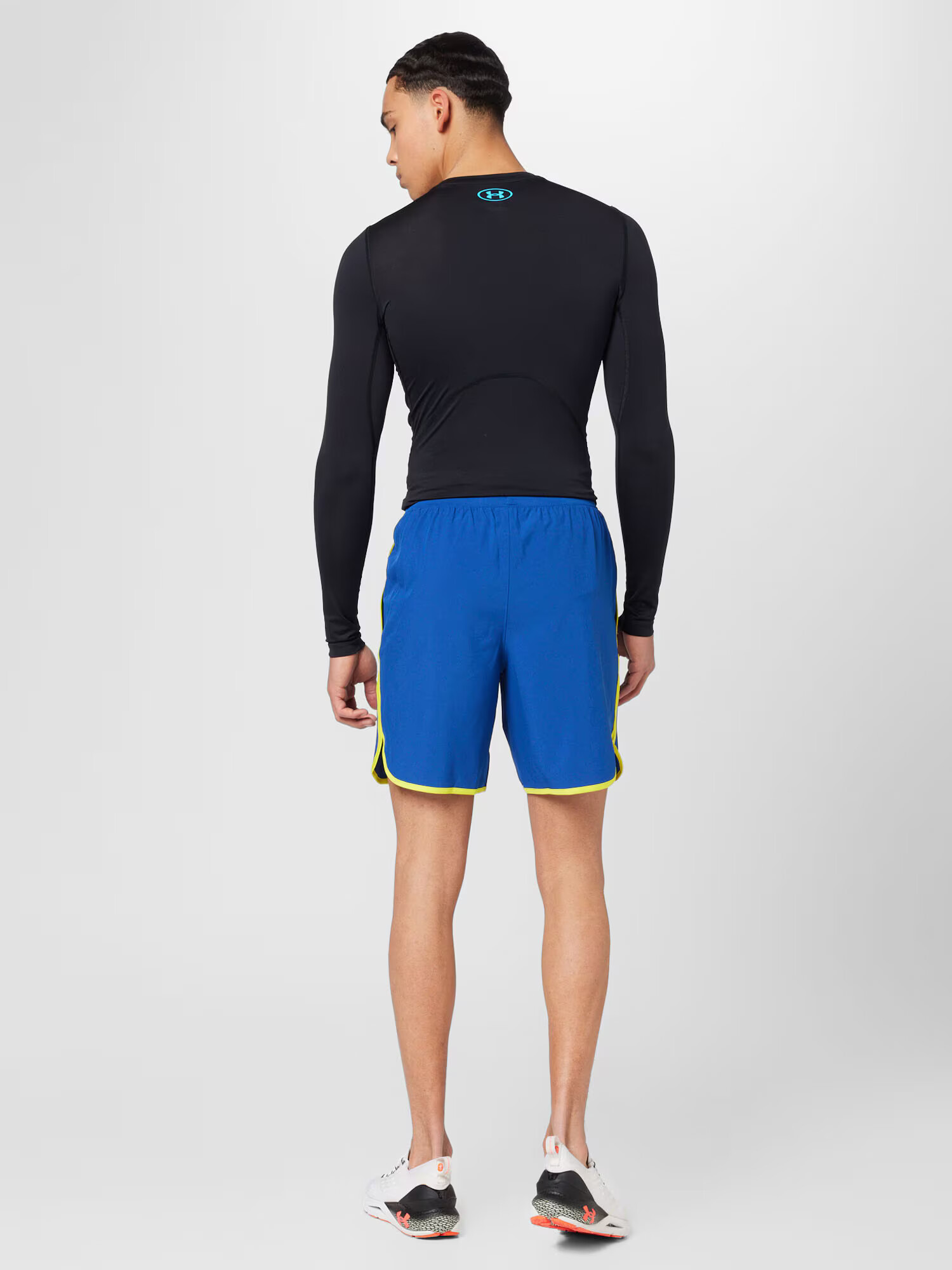 UNDER ARMOUR Športne hlače 'HIIT' modra / rumena - Pepit.si