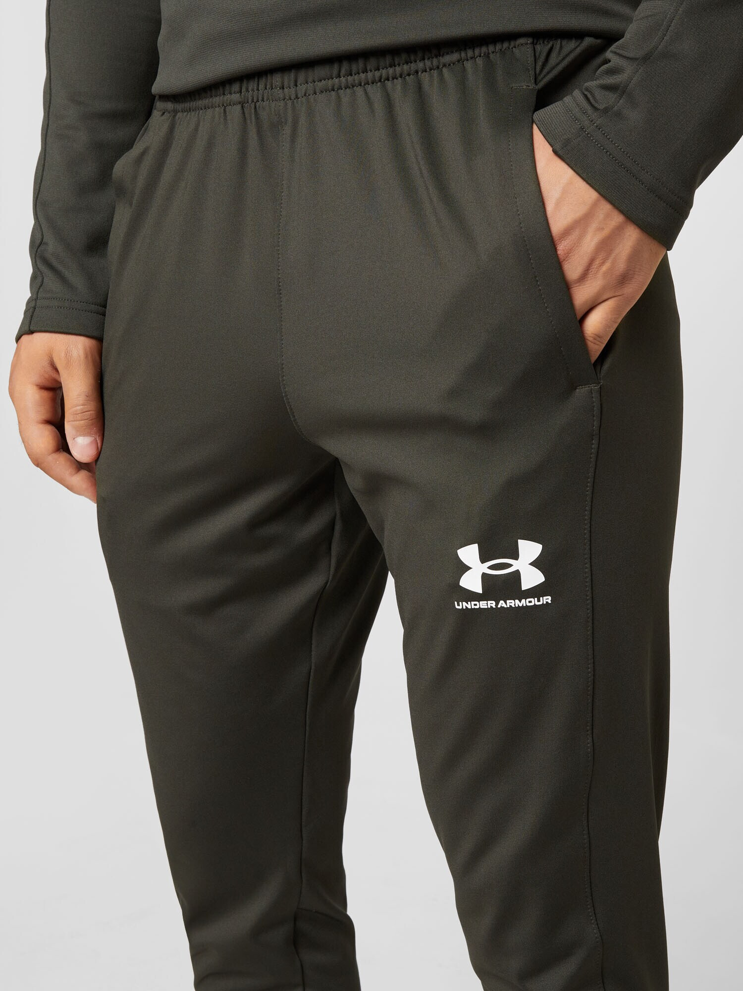 UNDER ARMOUR Športne hlače kaki / bela - Pepit.si