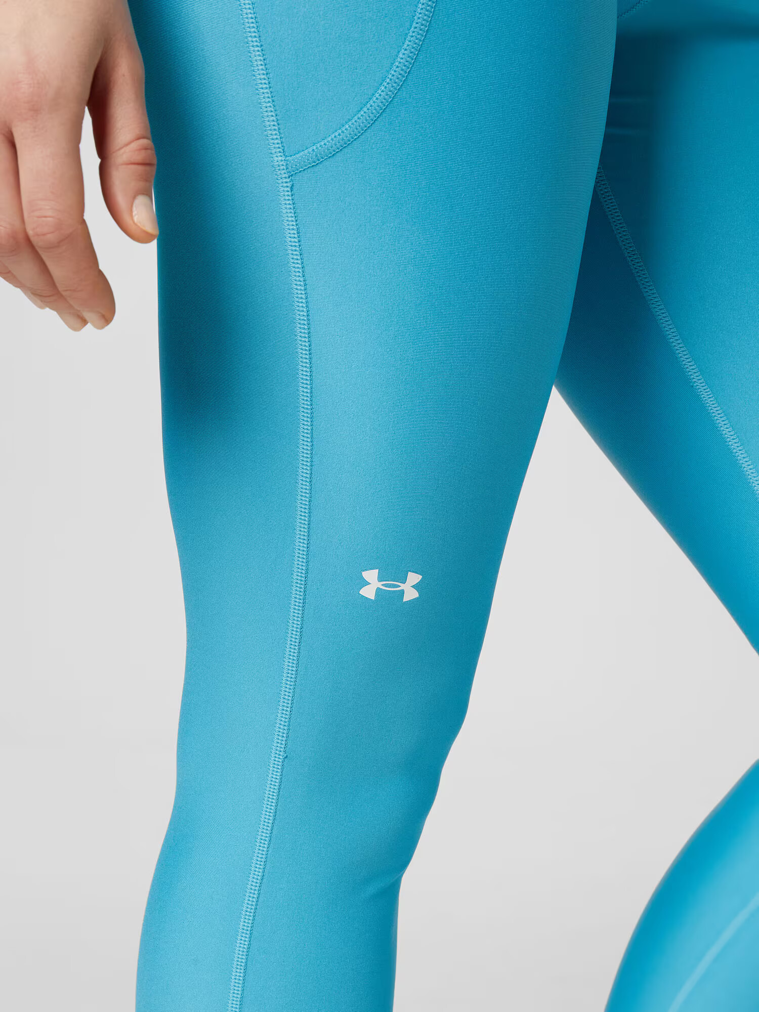 UNDER ARMOUR Športne hlače voda / bela - Pepit.si