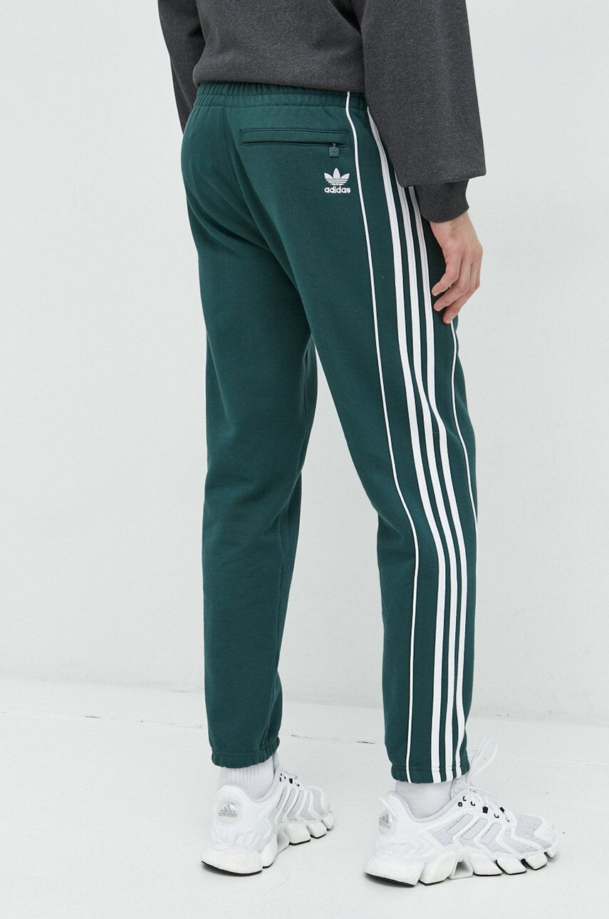 adidas Originals Bombažen spodnji del trenirke moški zelena barva - Pepit.si