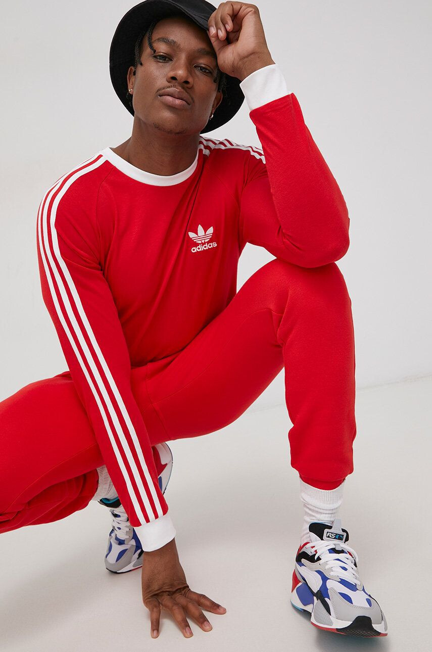 adidas Originals Hlače moški rdeča barva - Pepit.si