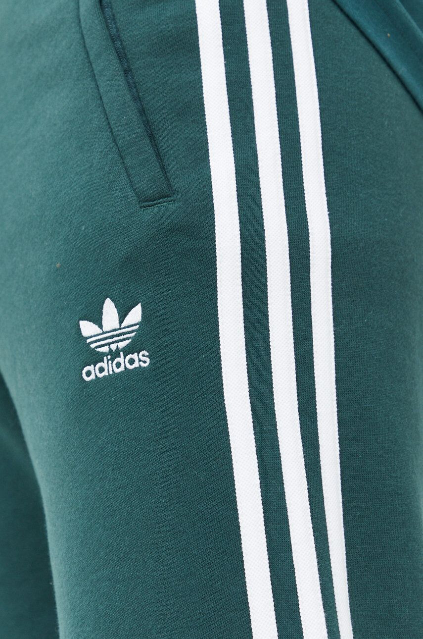 adidas Originals Spodnji del trenirke moški zelena barva - Pepit.si