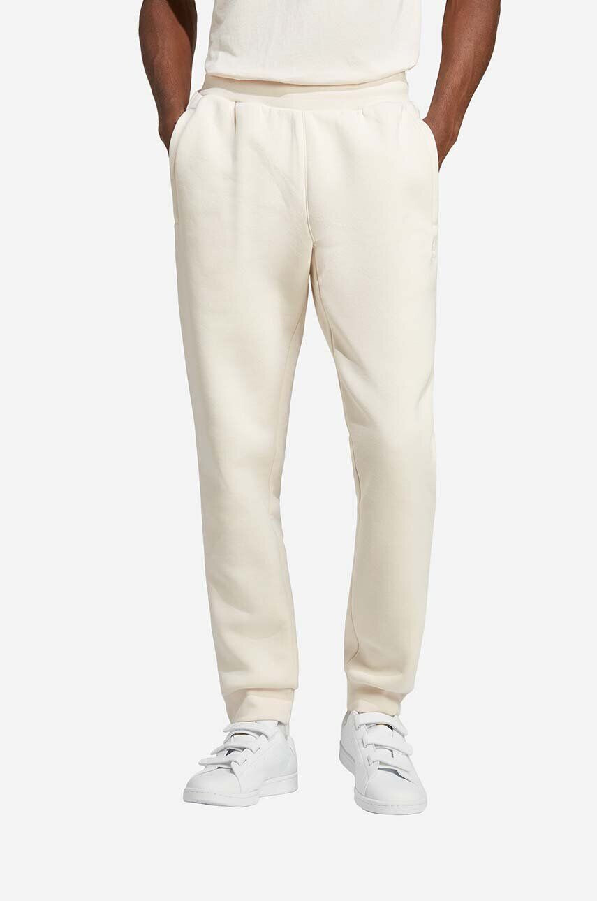 adidas Originals Spodnji del trenirke Trefoil Essentials Pants bež barva - Pepit.si