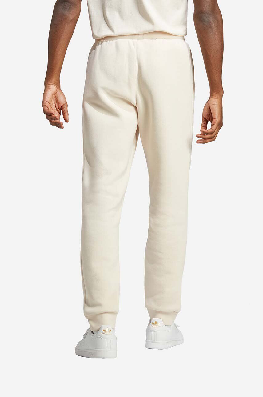 adidas Originals Spodnji del trenirke Trefoil Essentials Pants bež barva - Pepit.si