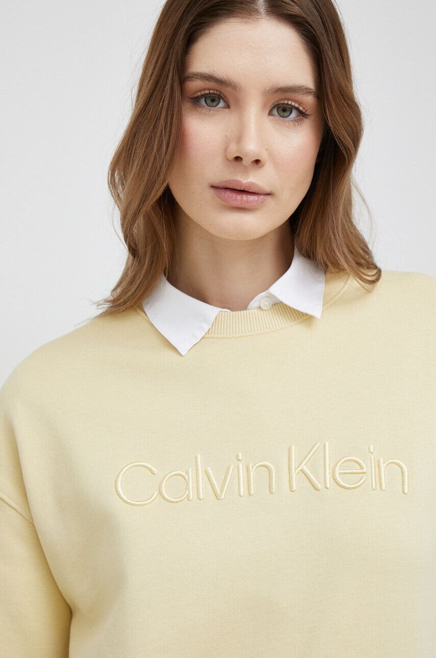 Calvin Klein Bombažen pulover ženska bež barva - Pepit.si