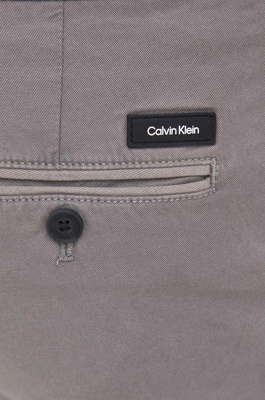 Calvin Klein Hlače moški siva barva - Pepit.si