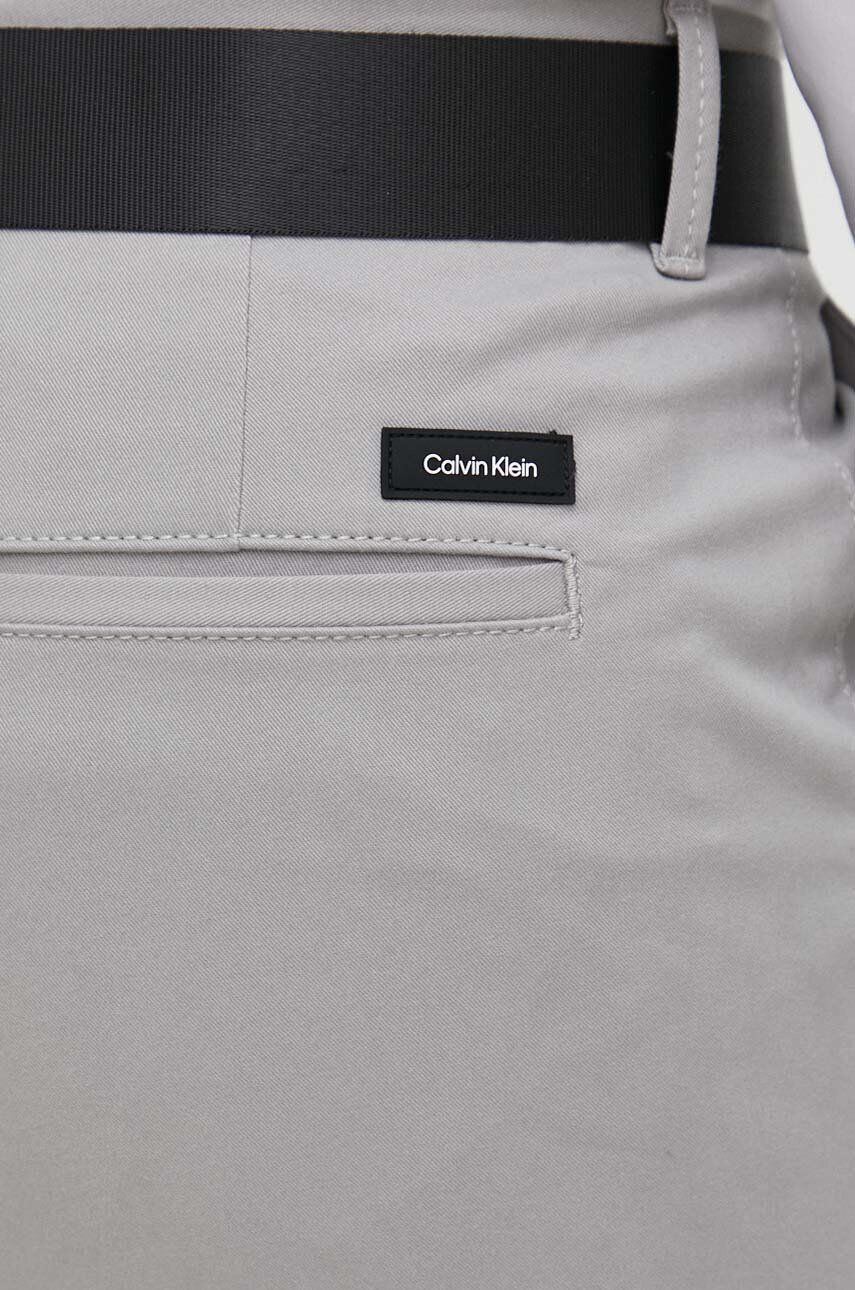 Calvin Klein Hlače moški siva barva - Pepit.si