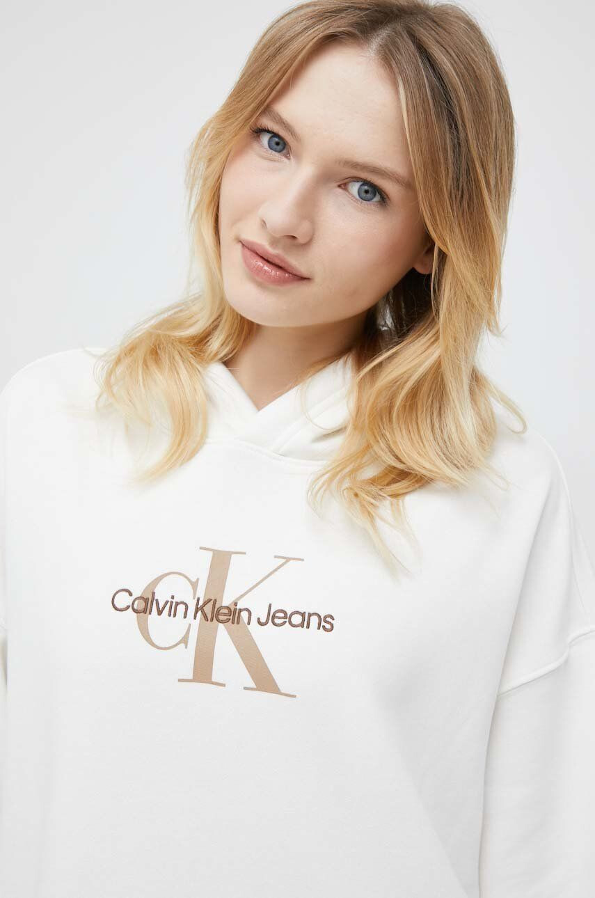 Calvin Klein Jeans Bluza ženska bež barva s kapuco - Pepit.si