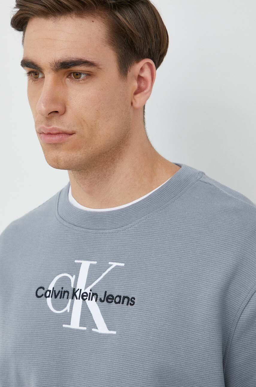 Calvin Klein Jeans Bombažen pulover ženska črna barva s kapuco - Pepit.si