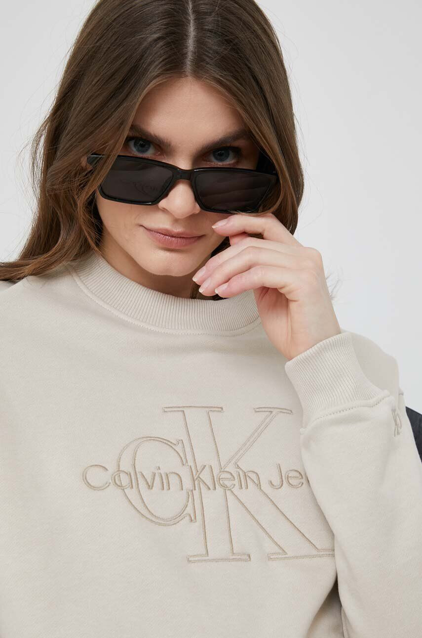 Calvin Klein Jeans Bombažen pulover ženska bež barva - Pepit.si