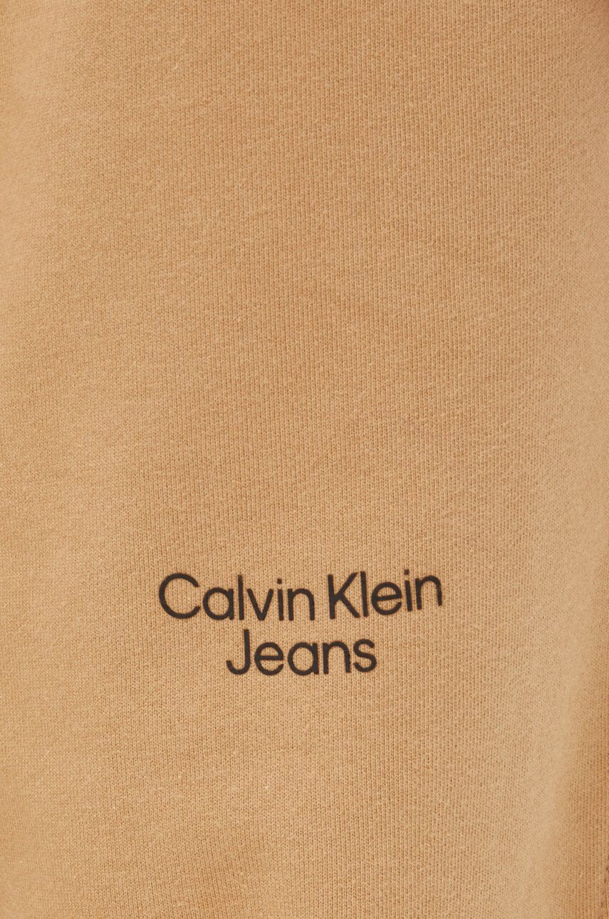 Calvin Klein Jeans Bombažen spodnji del trenirke moški rjava barva - Pepit.si