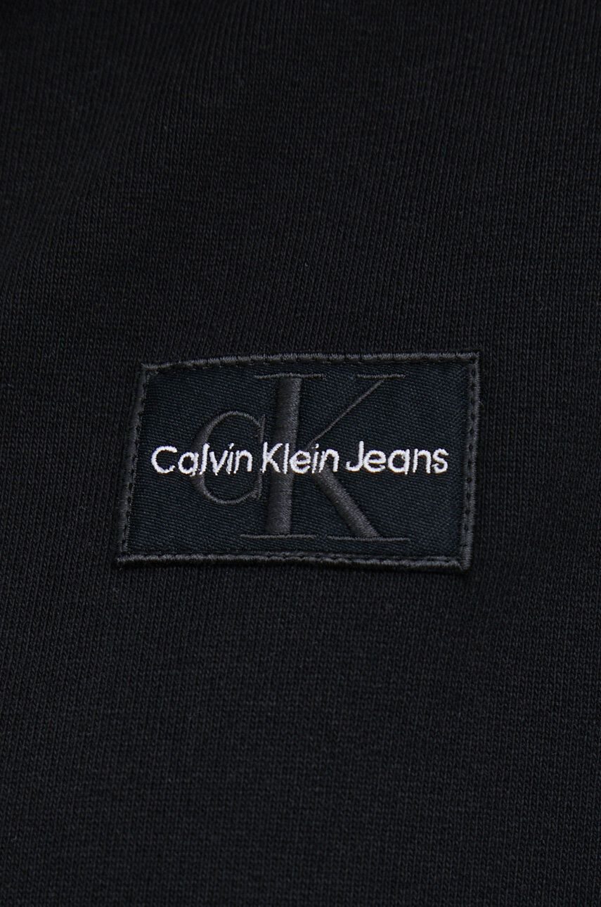 Calvin Klein Jeans Bombažna mikica ženska črna barva s kapuco - Pepit.si