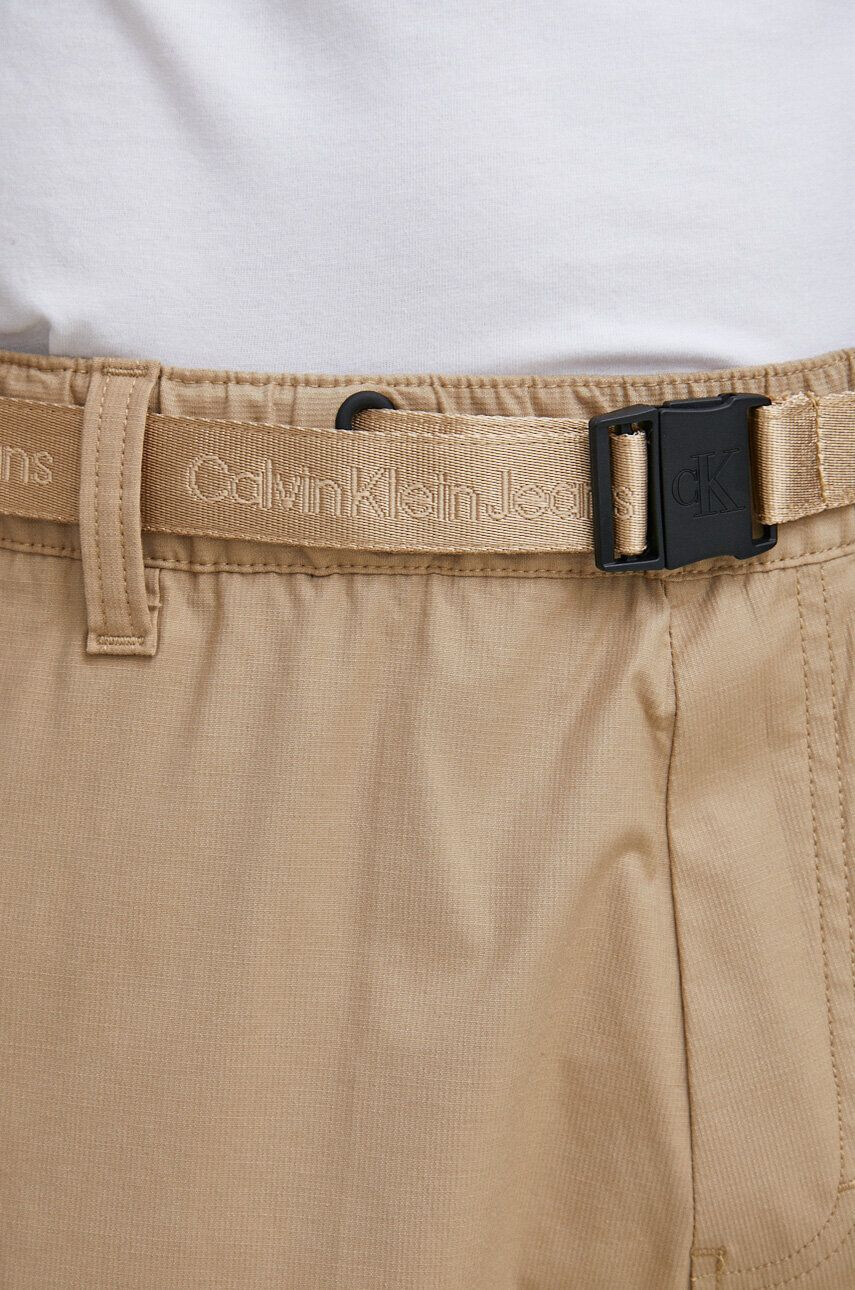 Calvin Klein Jeans Hlače moški rjava barva - Pepit.si