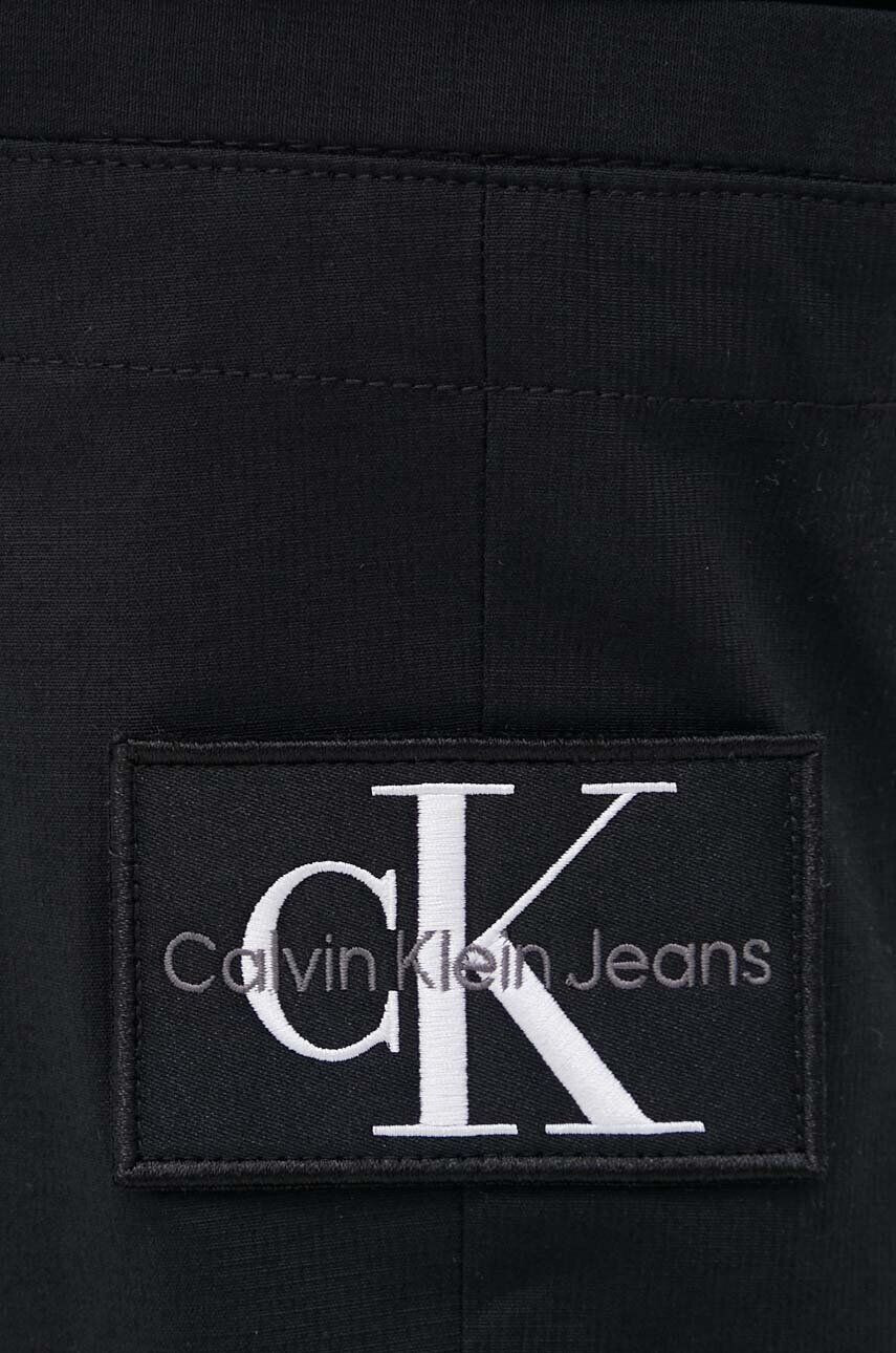 Calvin Klein Jeans Hlače moški črna barva - Pepit.si