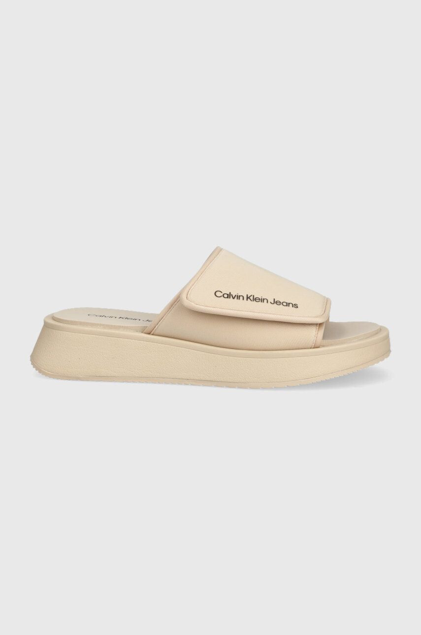 Calvin Klein Jeans Natikači One-strap Sandal ženski bež barva - Pepit.si