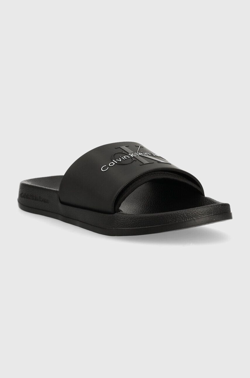 Calvin Klein Jeans Natikači SLIDE MONOGRAM TPU ženski črna barva YW0YW00585 - Pepit.si