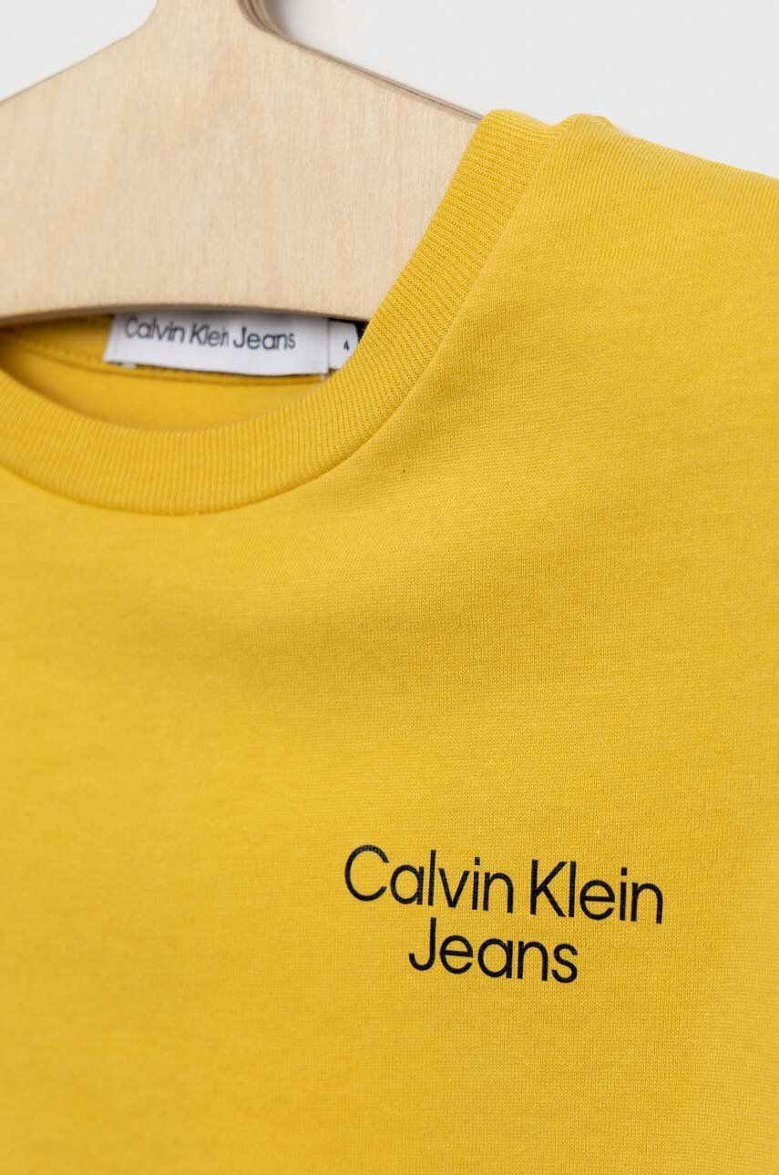 Calvin Klein Jeans Otroška bombažna kratka majica rumena barva - Pepit.si