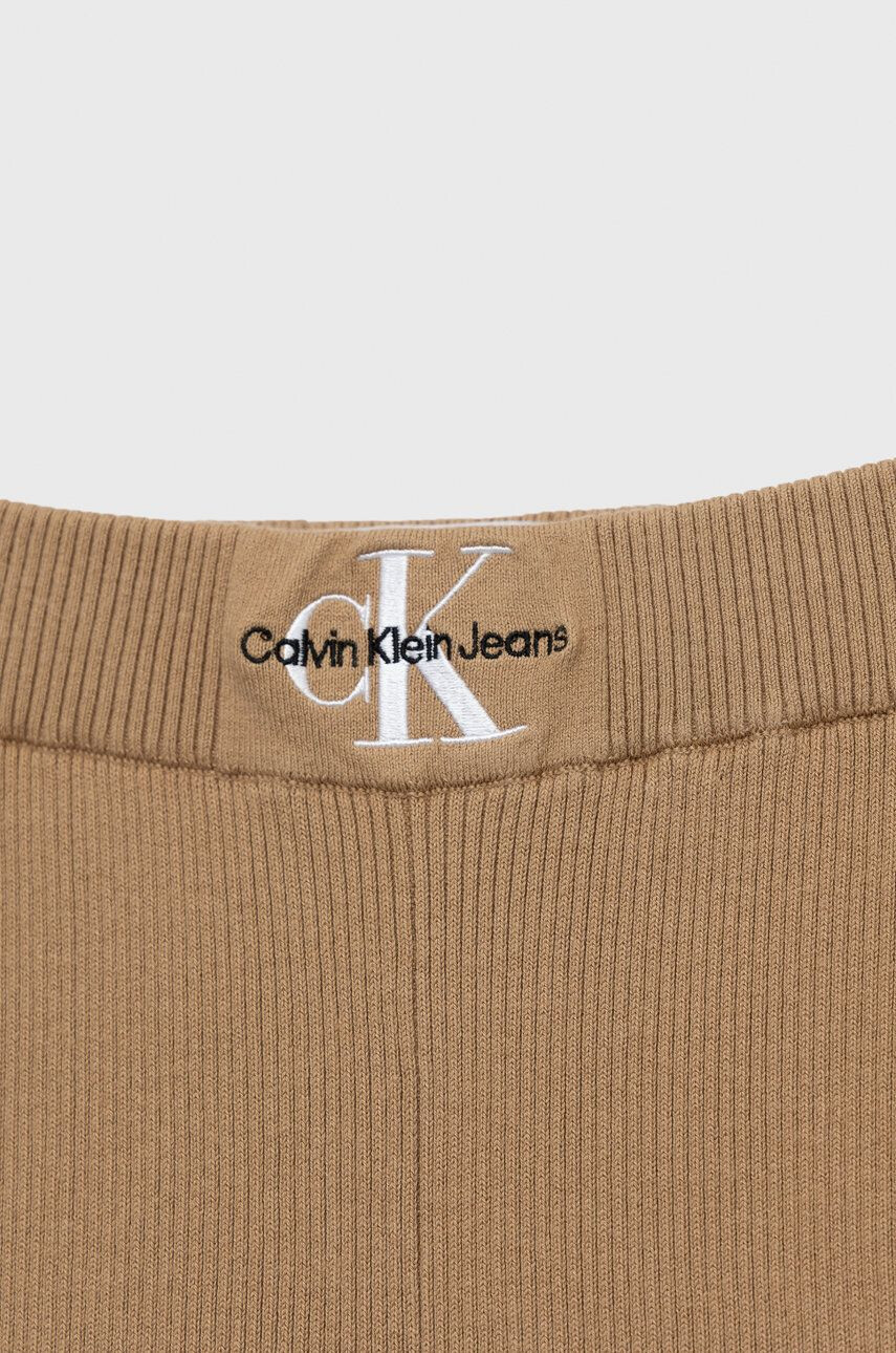 Calvin Klein Jeans Otroške hlače bež barva - Pepit.si