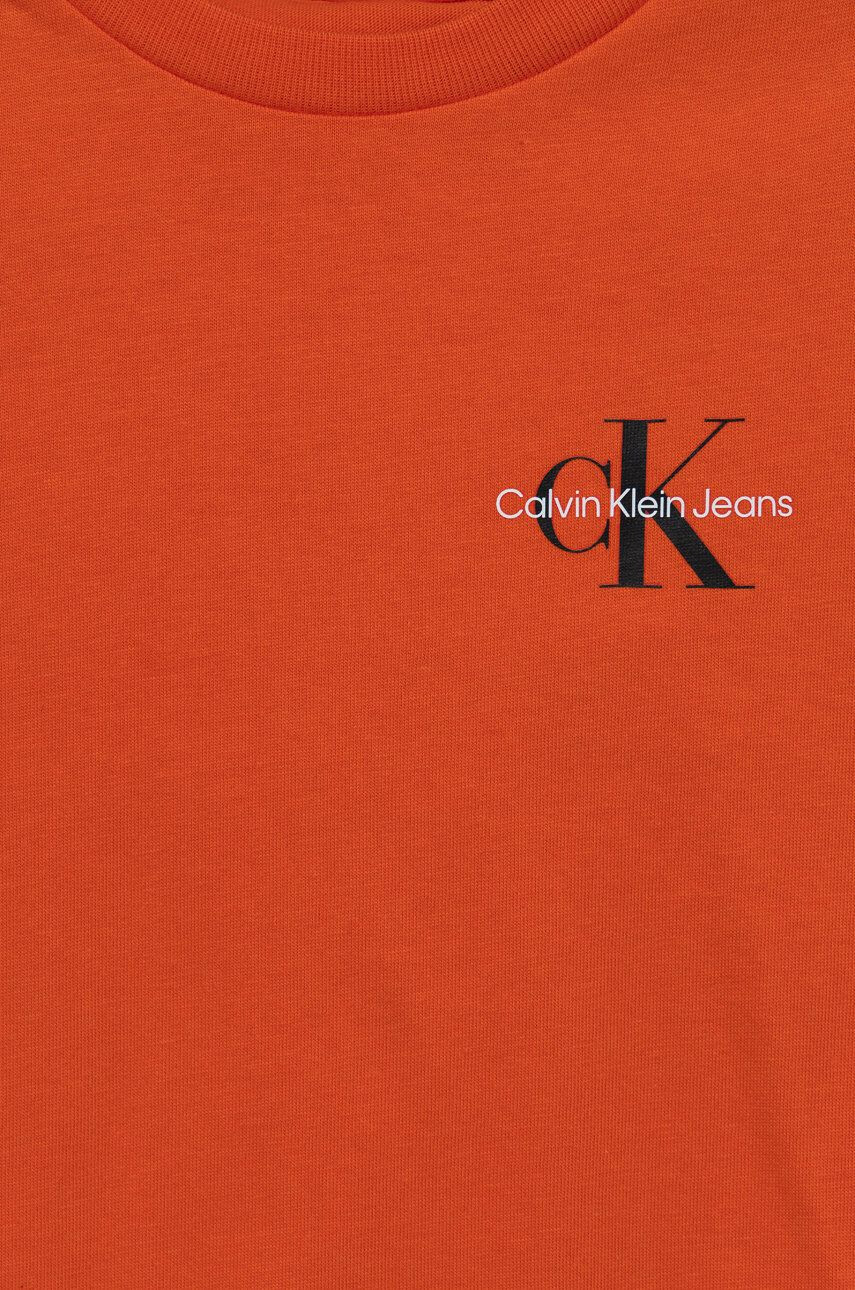 Calvin Klein Jeans Otroški bombažen t-shirt oranžna barva - Pepit.si