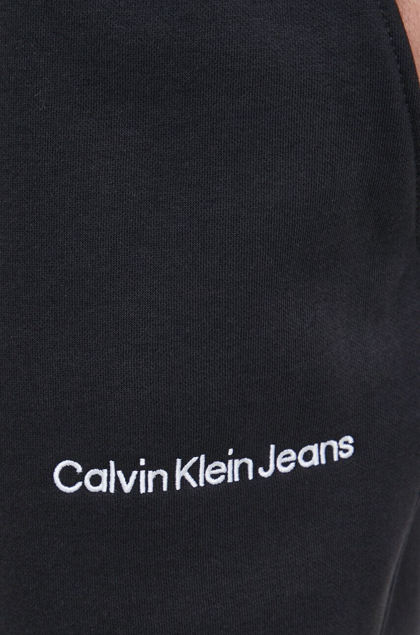 Calvin Klein Jeans Spodnji del trenirke črna barva - Pepit.si