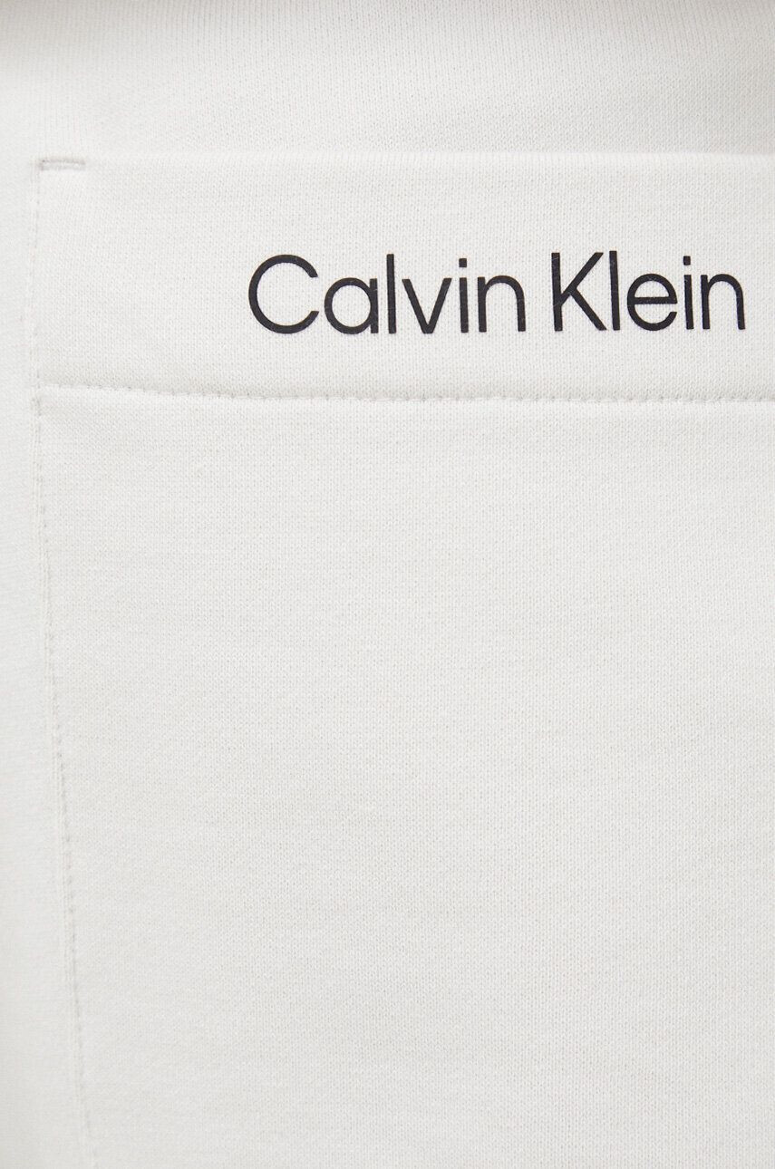 Calvin Klein Performance Kratke hlače CK Athletic moške bež barva - Pepit.si