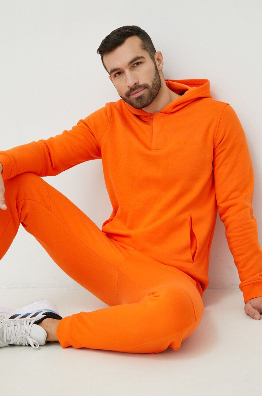 Calvin Klein Performance Pulover za vadbo moška oranžna barva s kapuco - Pepit.si