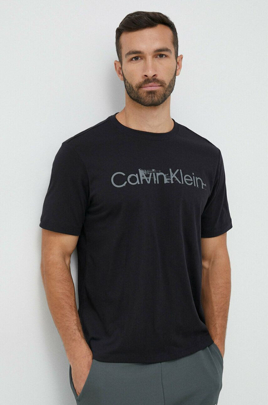 Calvin Klein Performance Športna kratka majica Essentials - Pepit.si