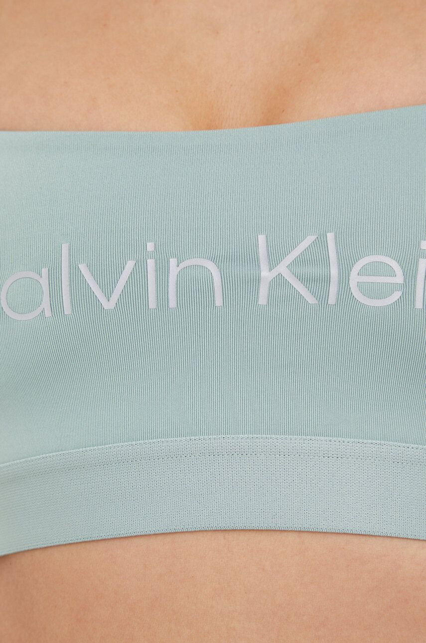 Calvin Klein Performance Športni modrček Ck Essentials turkizna barva - Pepit.si