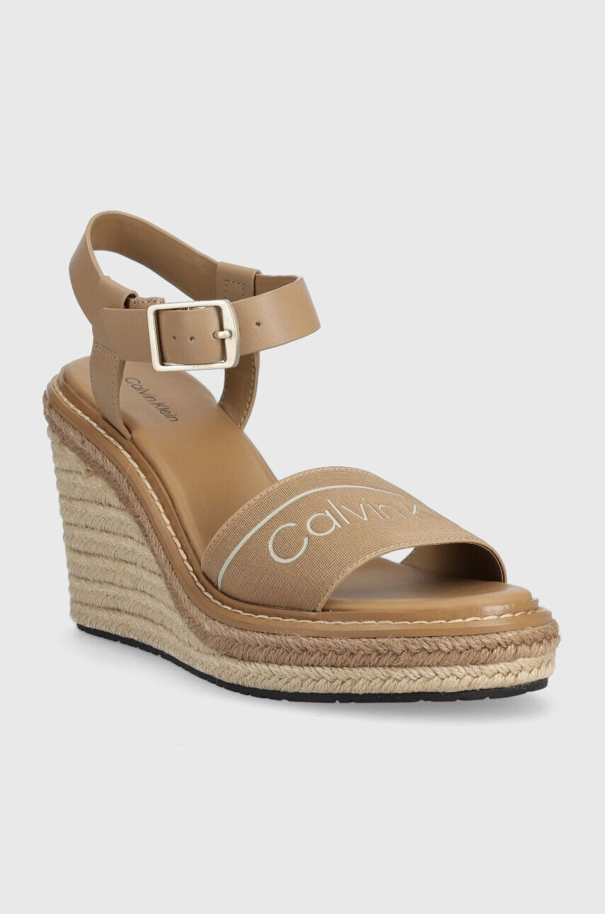 Calvin Klein Sandali WEDGE 70HH - HE ženski bež barva HW0HW01499 - Pepit.si