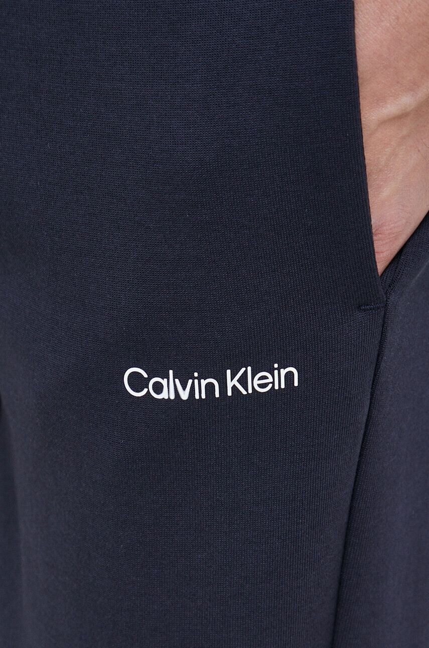 Calvin Klein Spodnji del trenirke moški mornarsko modra barva - Pepit.si