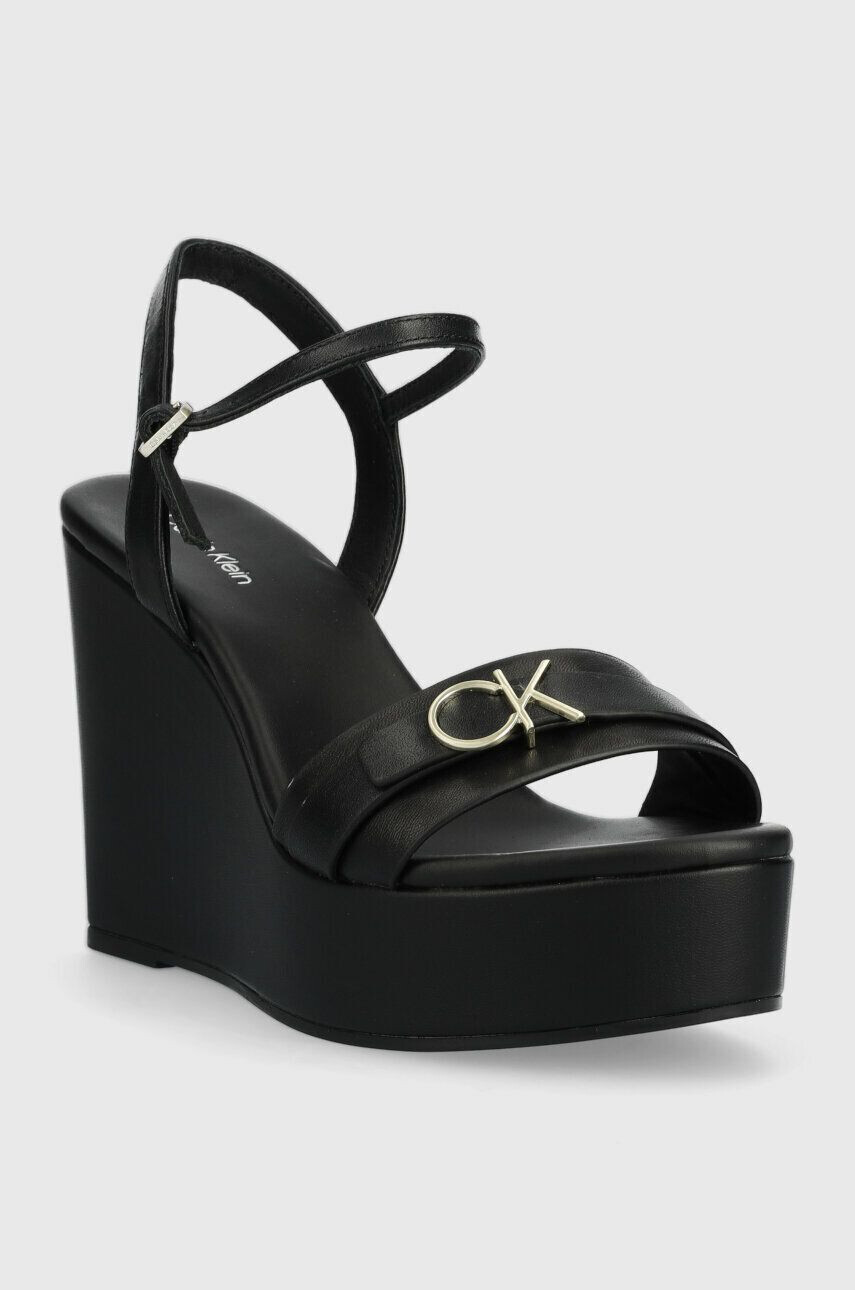 Calvin Klein Usnjeni sandali WEDGE 70HH W/HW ženski črna barva HW0HW01485 - Pepit.si