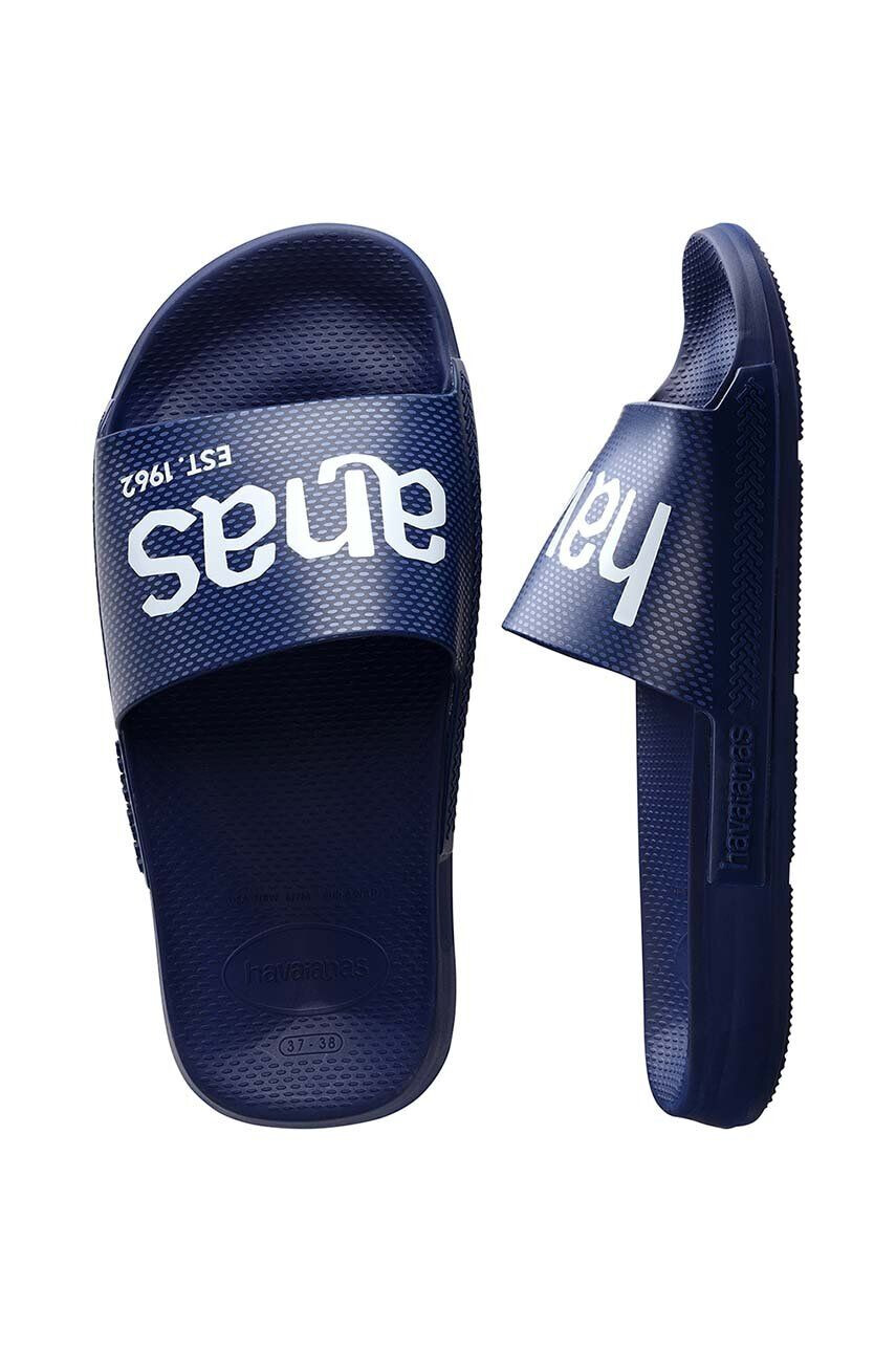 Havaianas Natikači SLIDE CLASSIC LOGOMANIA mornarsko modra barva 4148124.0555 - Pepit.si