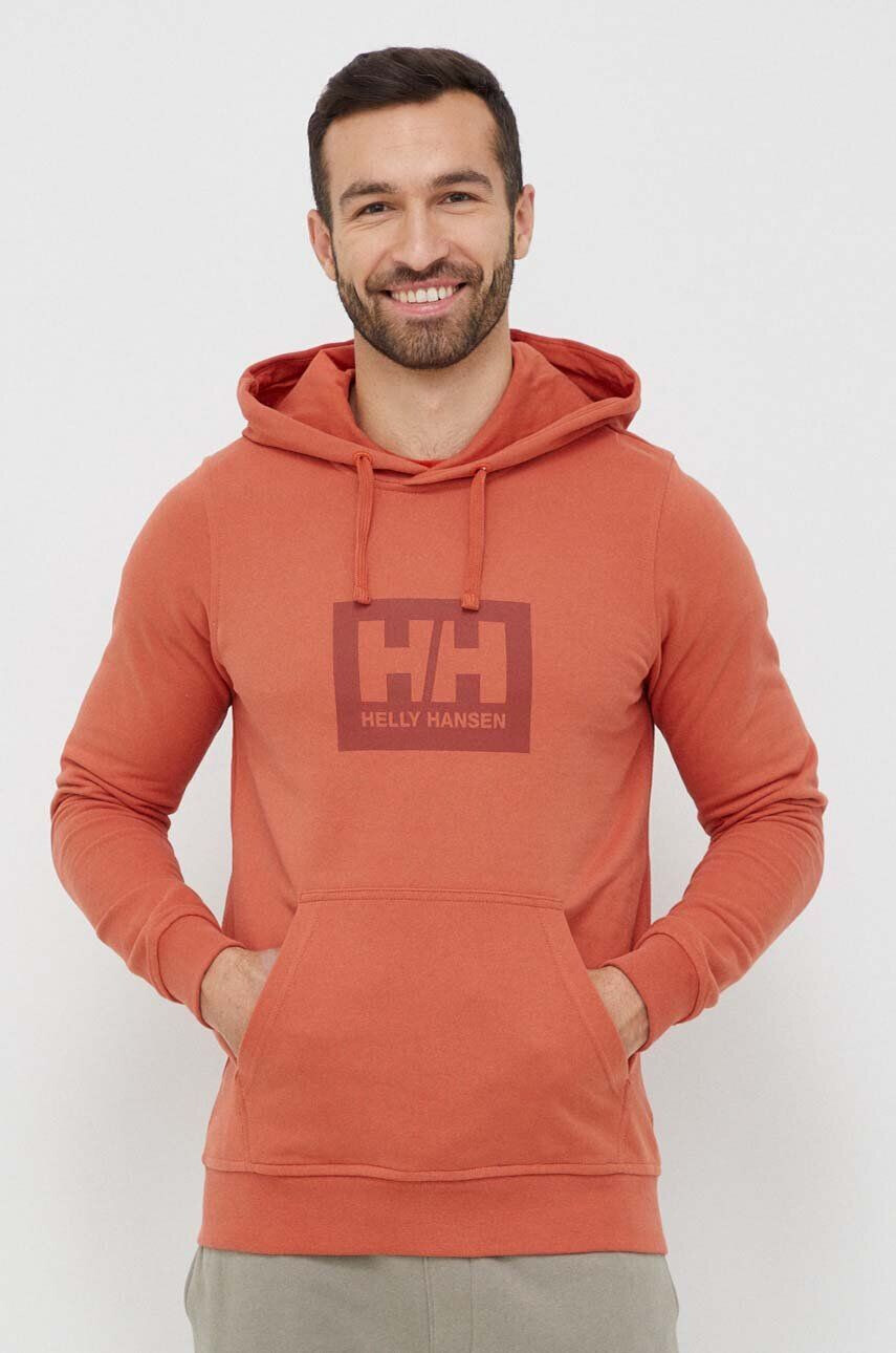 Helly Hansen Bombažen pulover oranžna barva s kapuco - Pepit.si