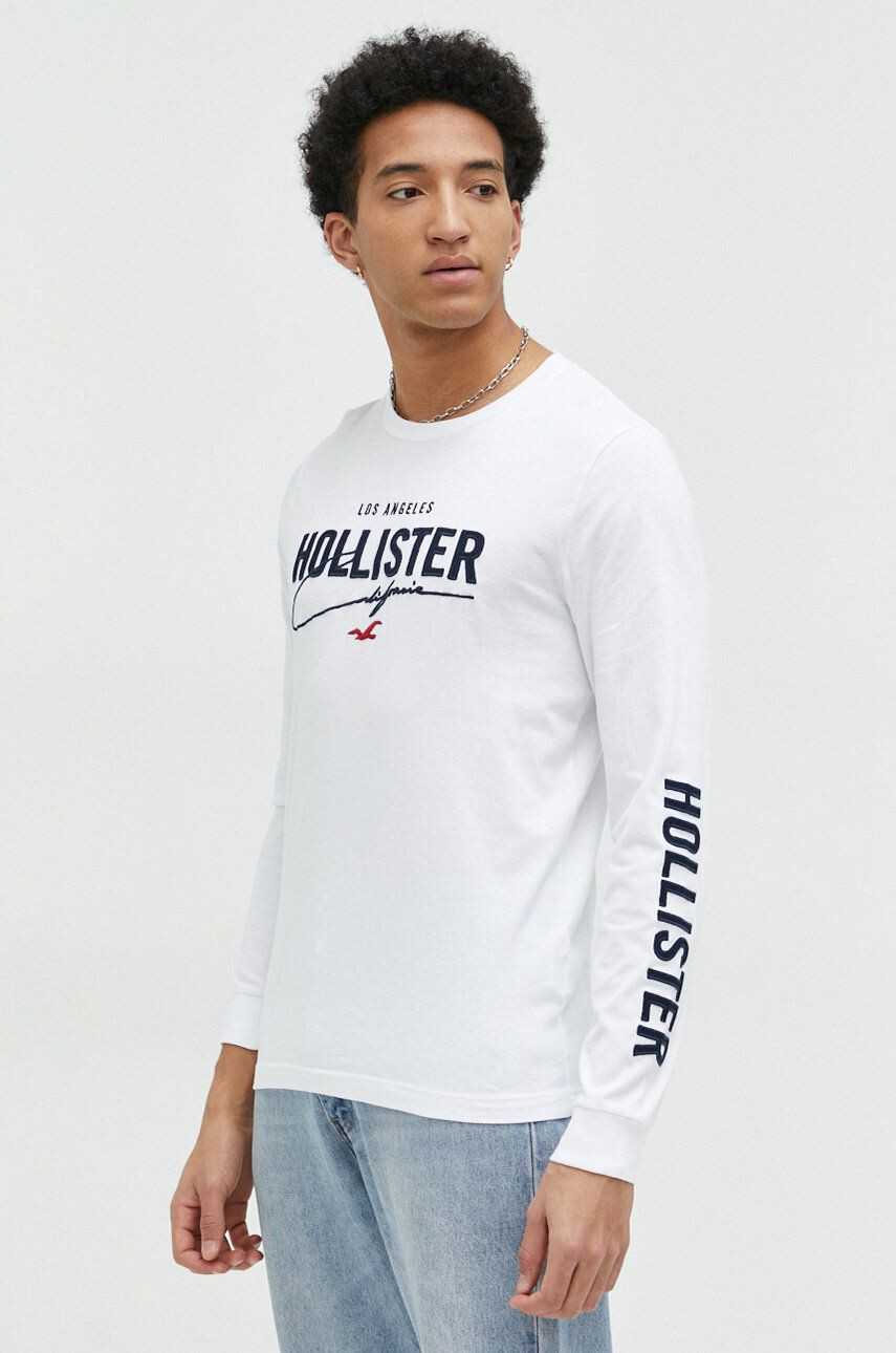 Hollister Co. Bombažna majica z dolgimi rokavi bela barva - Pepit.si