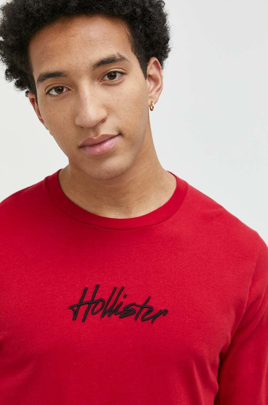 Hollister Co. Bombažna majica z dolgimi rokavi rdeča barva - Pepit.si