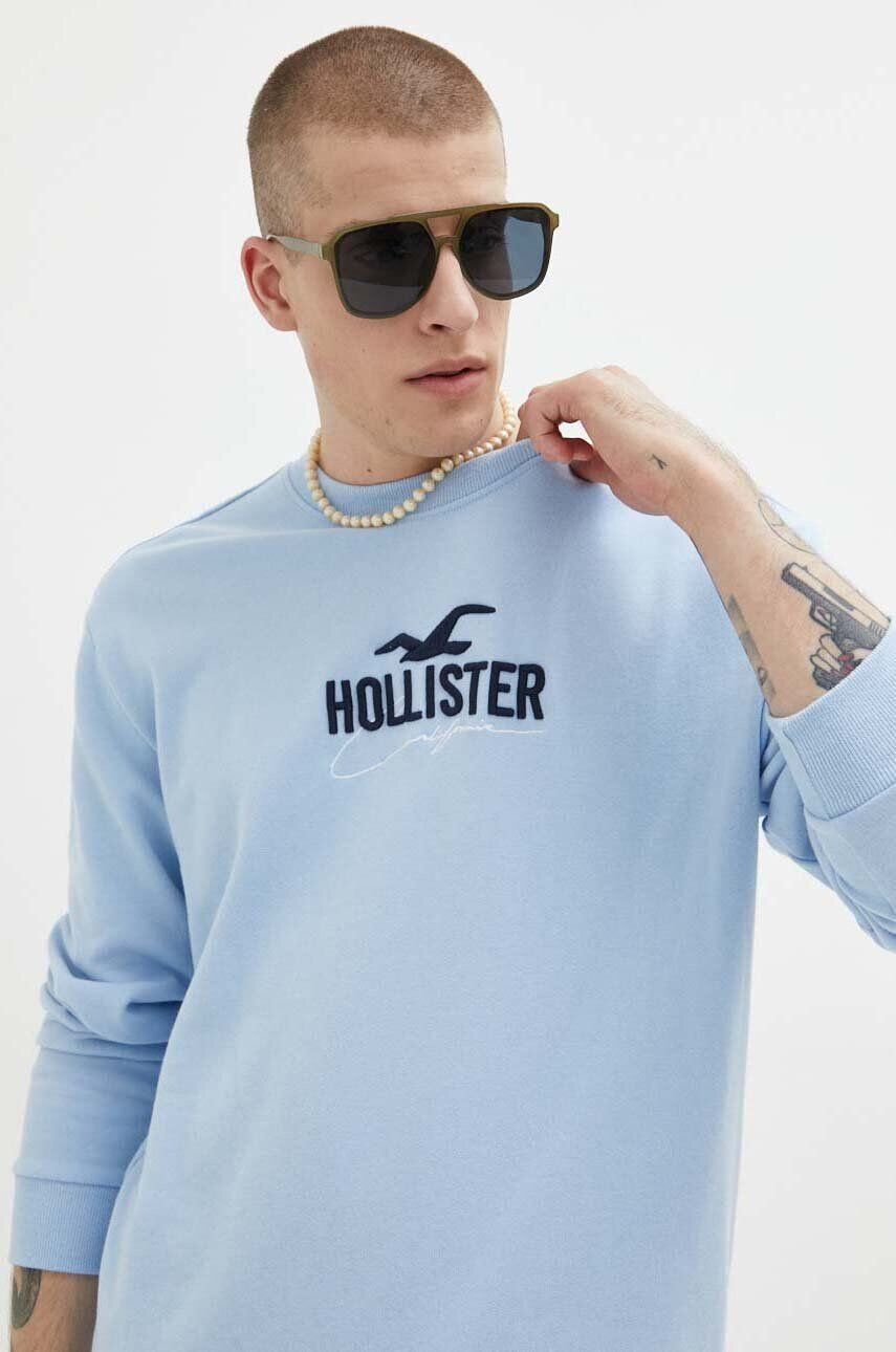 Hollister Co. Pulover ženska siva barva s kapuco - Pepit.si