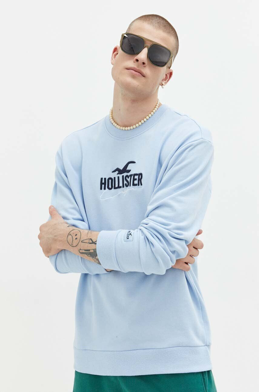 Hollister Co. Pulover ženska siva barva s kapuco - Pepit.si