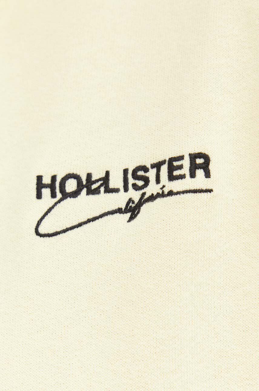 Hollister Co. Pulover moška rumena barva s kapuco - Pepit.si