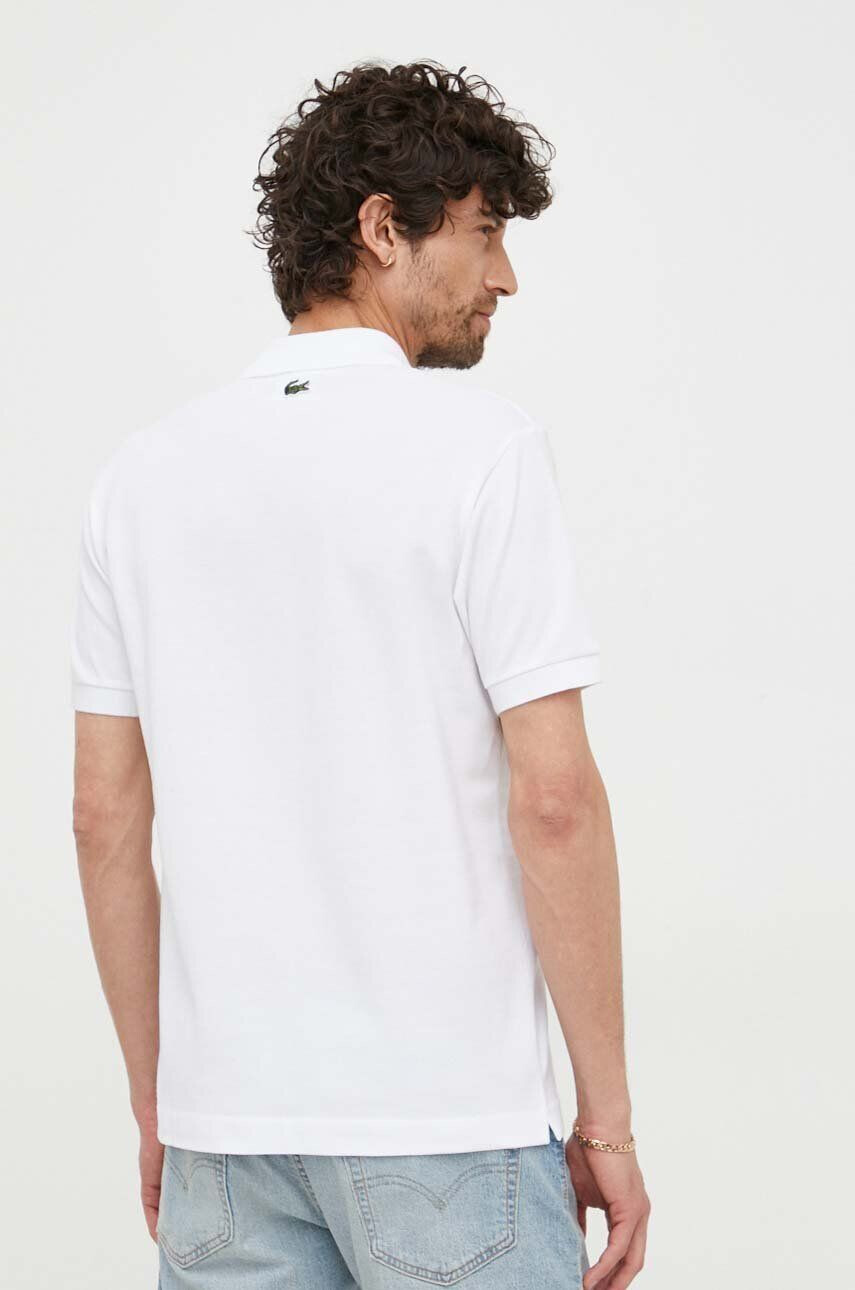 Lacoste Bombažen polo x Netflix bež barva - Pepit.si