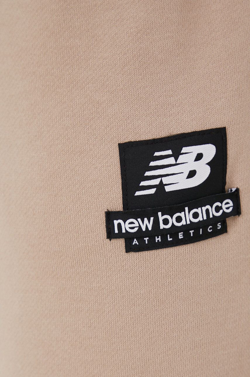 New Balance Bombažen spodnji del trenirke moški bež barva - Pepit.si