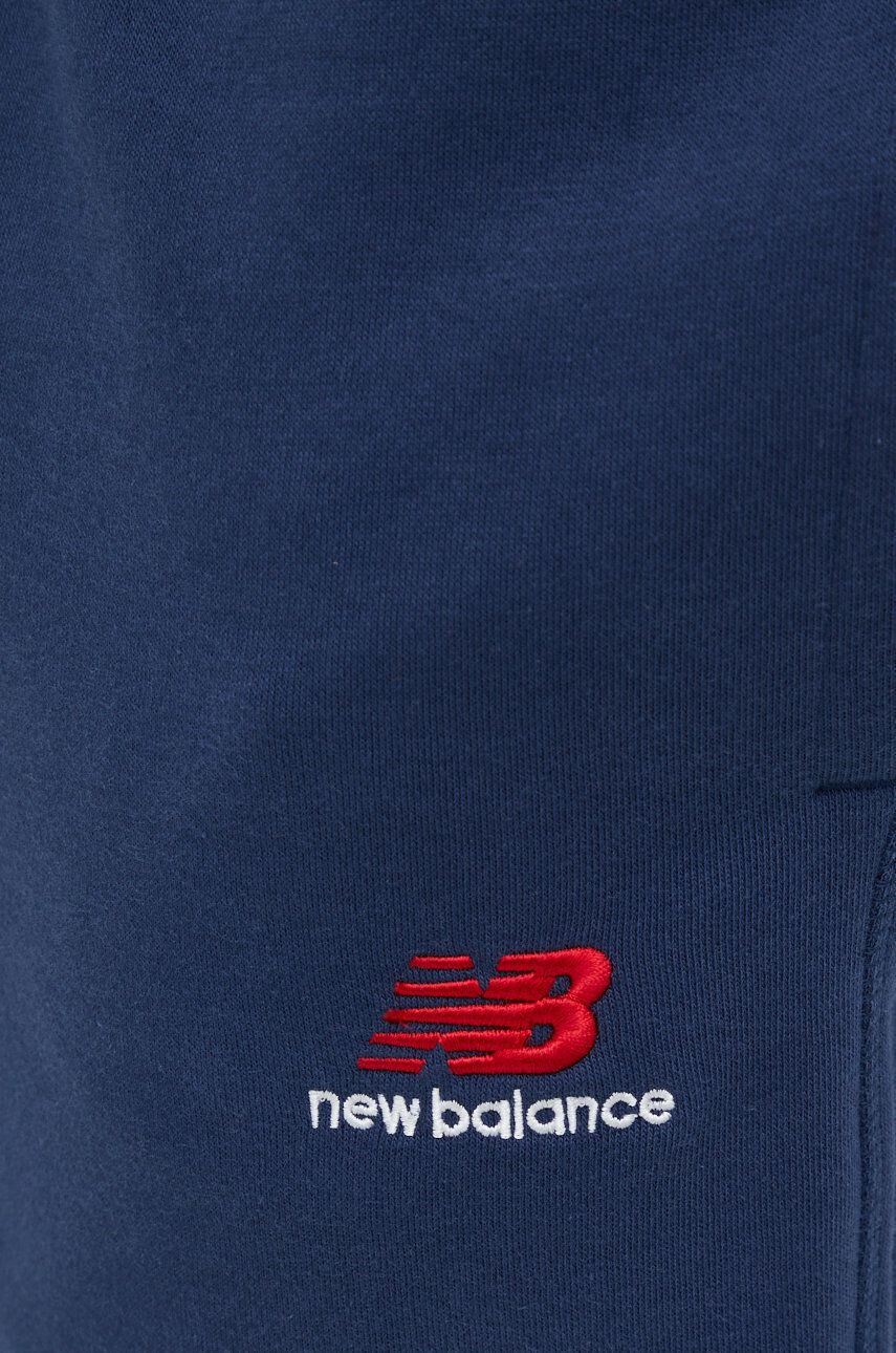 New Balance Spodnji del trenirke moški mornarsko modra barva - Pepit.si